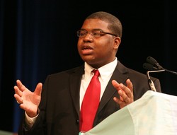 A man at a podium speaking