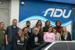 Mueller and her campus ministry colleagues tour a water project in Guatemela, 2009. Mueller is second from right, first row.