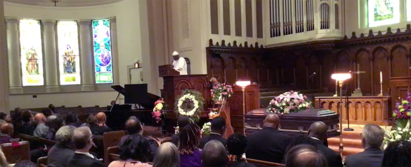 Rev. Dr. Mark Ogunwale Lomax delivers the eulogy at the funeral. Photo provided.